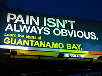 Corrected Billboard "Defends" Transparency at Guantanamo Bay