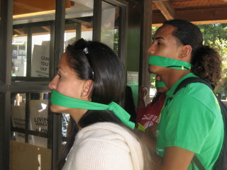 mouths_covered-students_and_workers_symbolize_how_they_have_been_silenced.jpg 