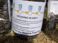 housing_is_key_rally-state_capitol_3-10-08_jar_close_up.jpg