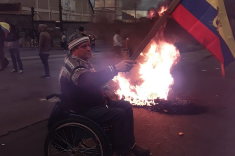480_a_disabled_protester_in_quito__ecuador_1.jpg